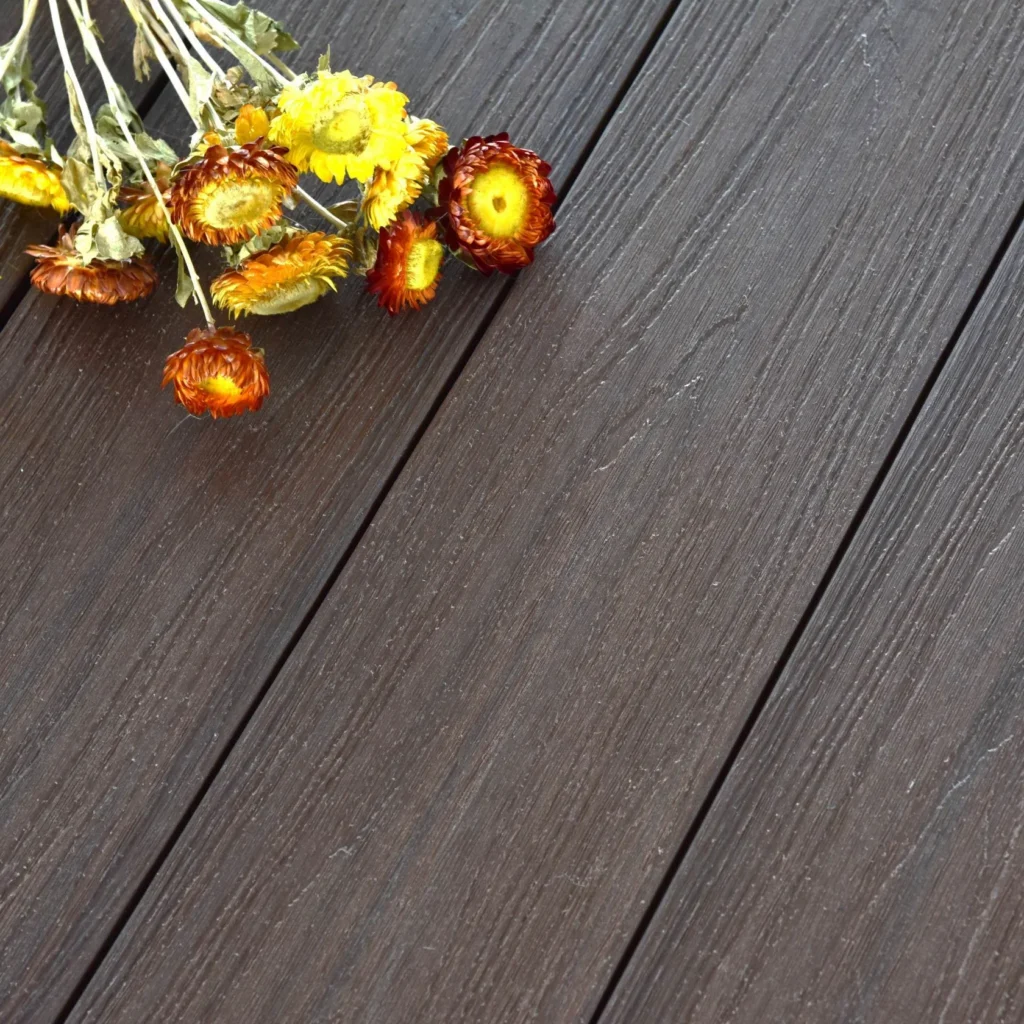 teak brown composite decking with flowers on